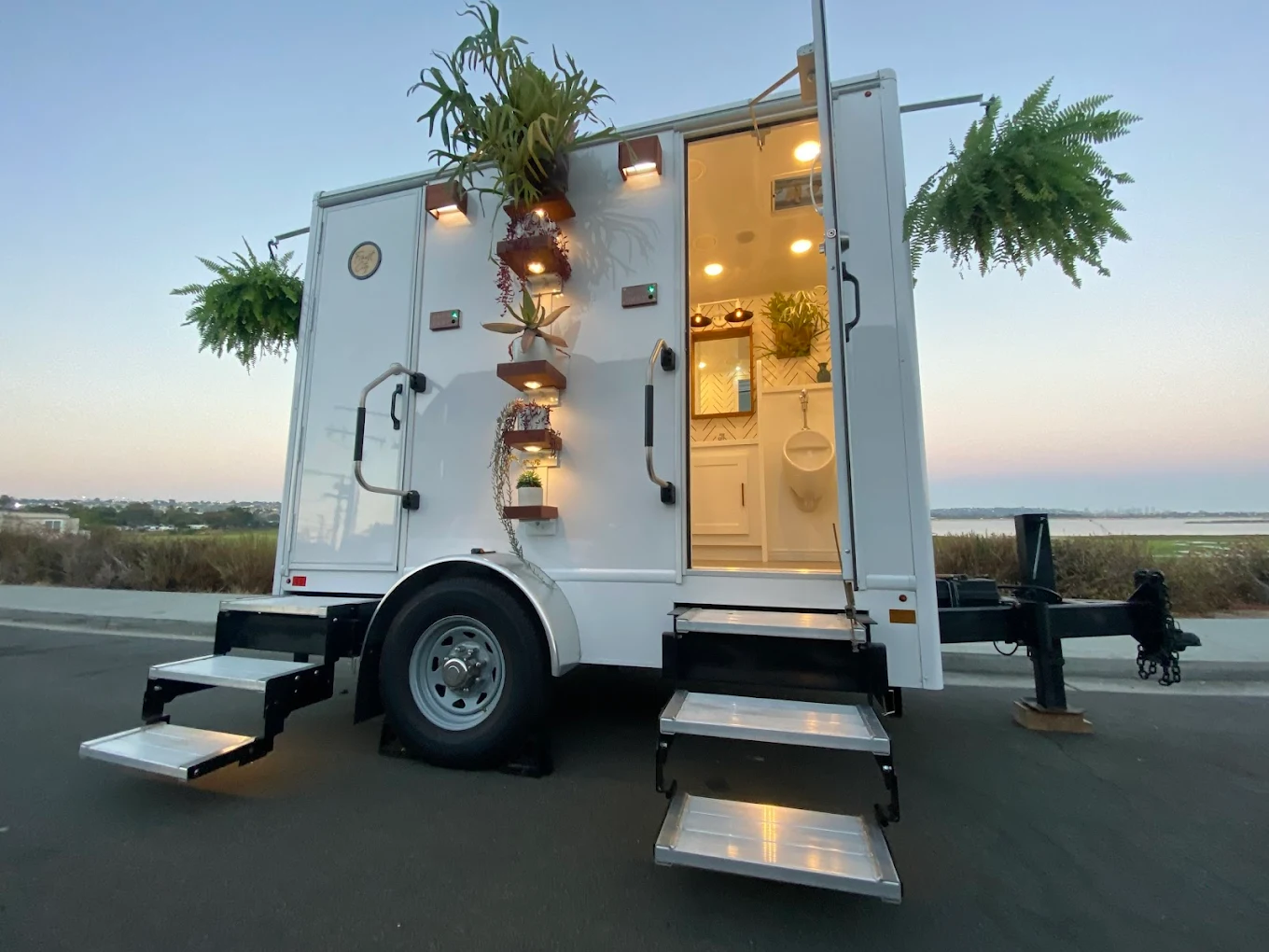 Luxury restroom trailer at an outdoor event